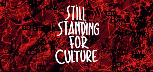 logo Still Standing for Culture sur fond rouge